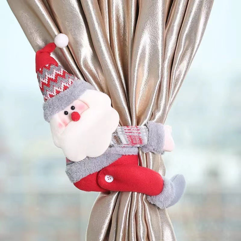 Plush Santa curtain tieback with red suit, grey hat, and striped sweater accents