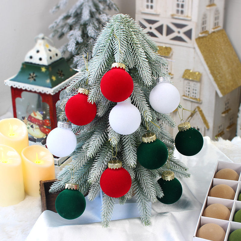 Velvet Christmas tree ornaments with gold caps in red, white, and green baubles