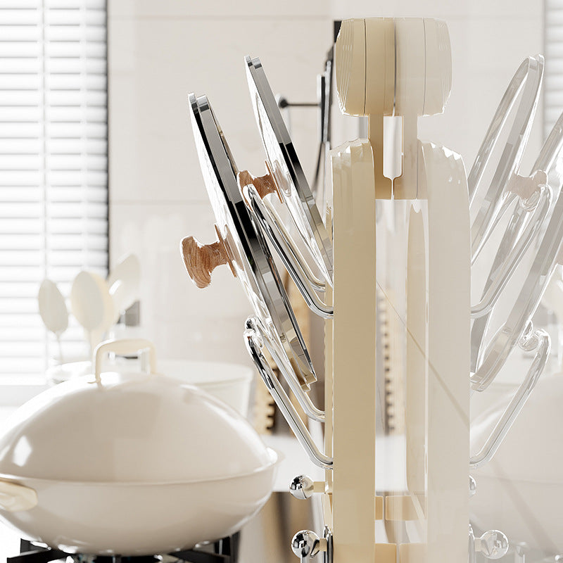 Wall-mounted pot lid organizer rack with vertical rails and chrome ring holders