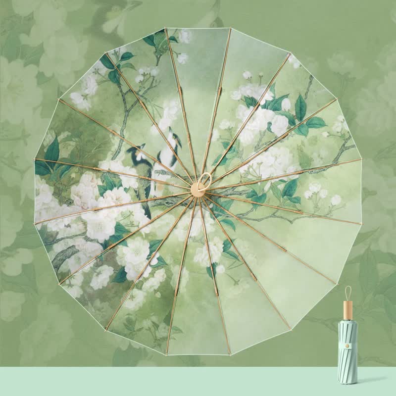 Green floral folding umbrella with gold ribs and circular center detail