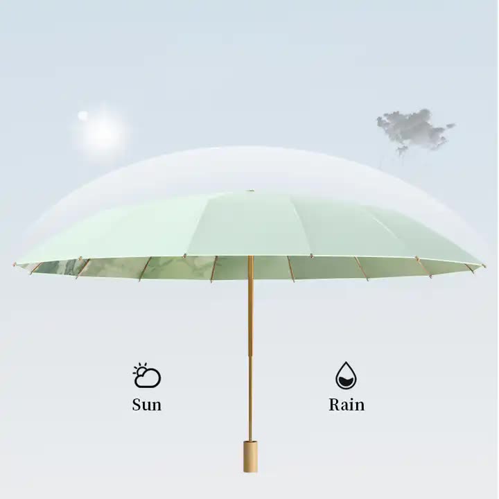 Light green folding umbrella with straight-edge canopy and gold pole