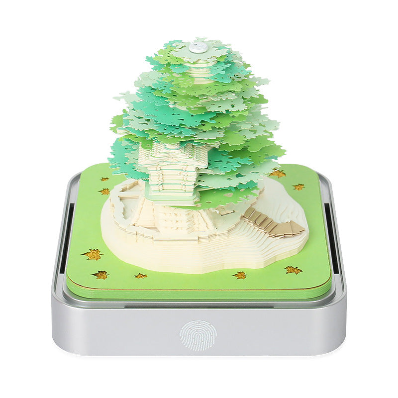 3D paper tree night light on silver base, green canopy with white layered trunk