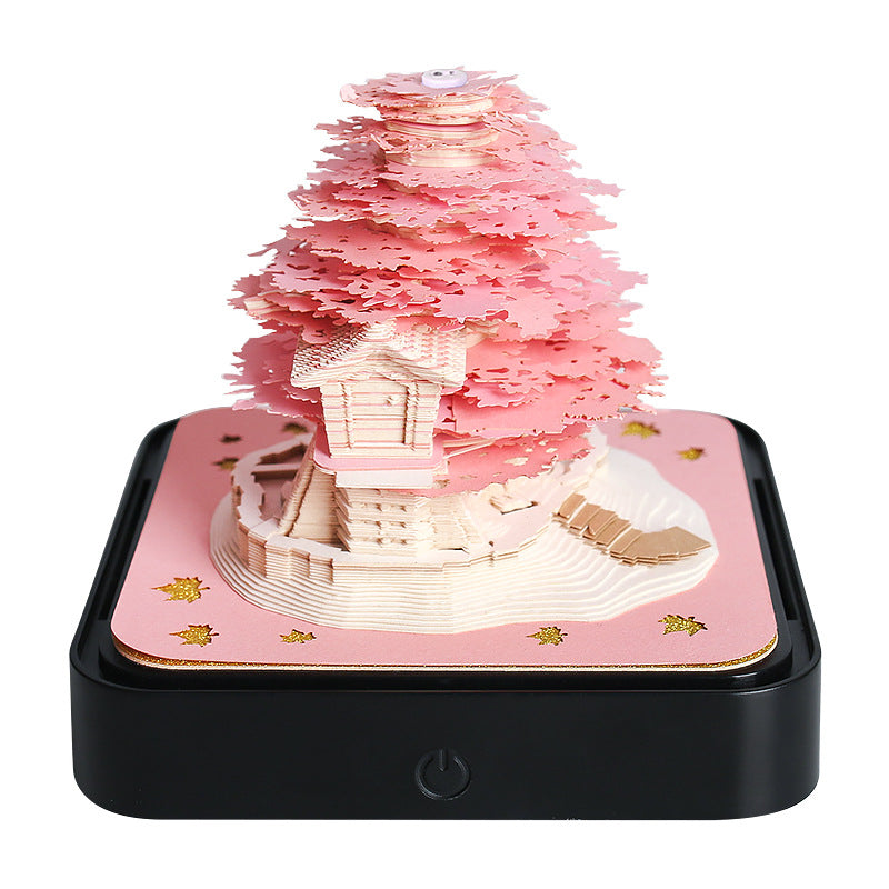 Pink tree house 3D paper night light on black base with pink layered sculpture