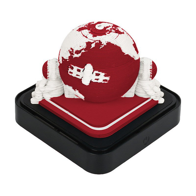 Earth 3D paper sculpture night light with notepad, red globe on black base