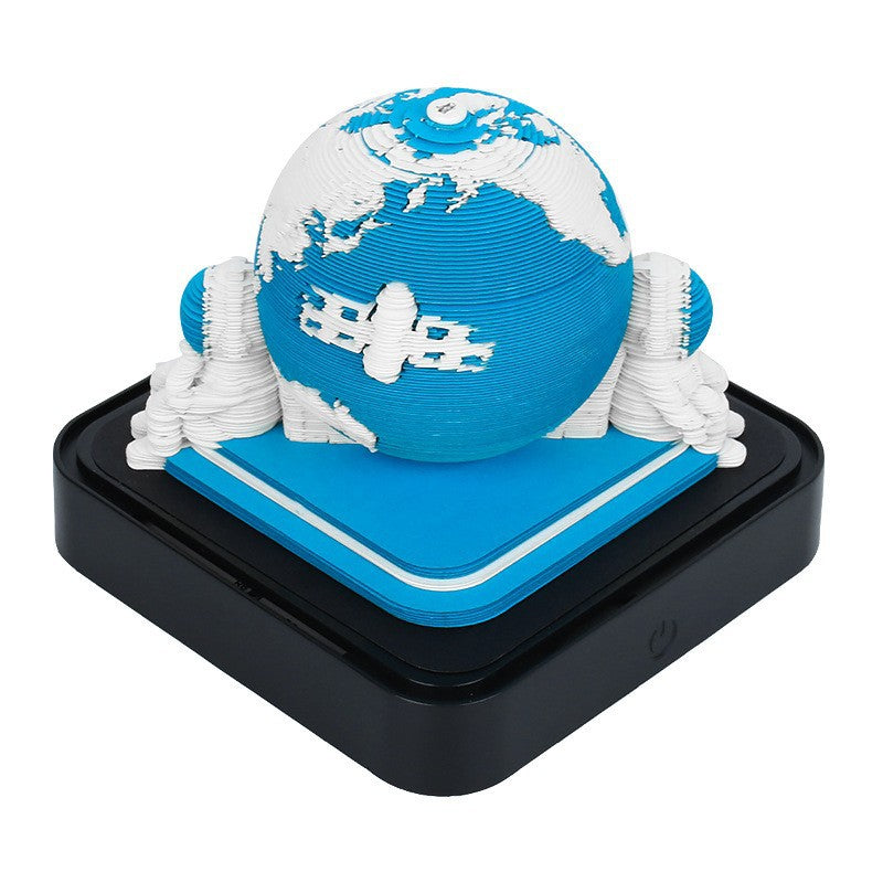 3D globe night light with blue Earth sphere, white paper coils, black base and memo pad
