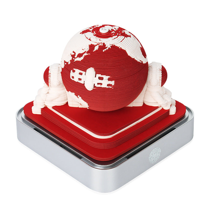 Red paper Earth globe night light with sculpted layers and silver square base
