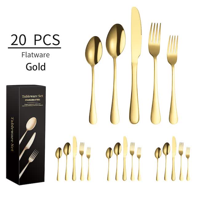 Stainless steel flatware set with gold-toned steak knife, fork, and spoon