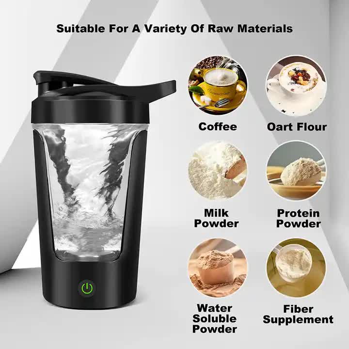 Black electric auto-stirring cup with clear mixing chamber and push-button base