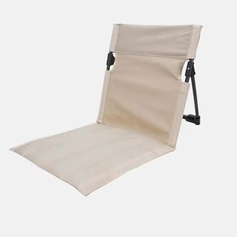 Beige folding lawn chair with backrest and extended seat, black metal legs