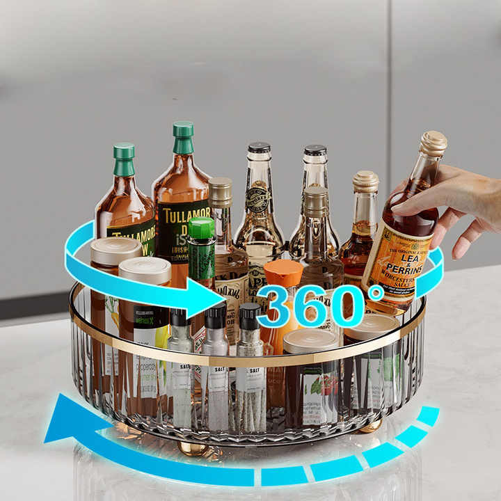 Rotating storage rack with green rim and clear tray holding spice bottles, 360° rotation
