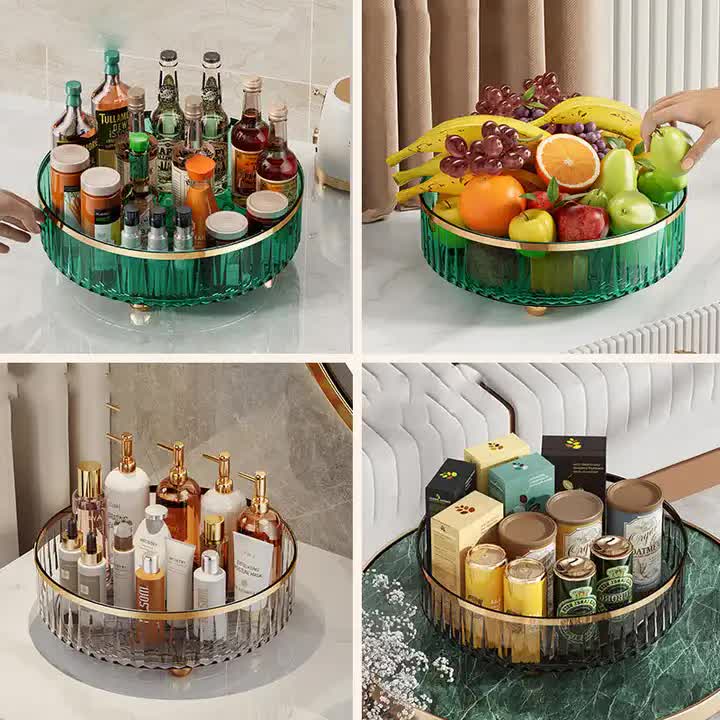 Rotating storage rack with green base holding bottles, jars, and a fruit-and-vegetable tray