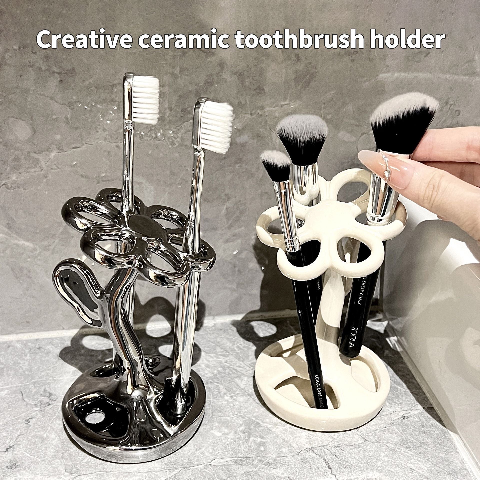 Ceramic toothbrush holder with glossy silver body holding multiple toothbrushes and brushes