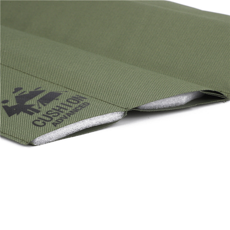 Olive foldable seat pad close-up with gray underside and logo print at edge