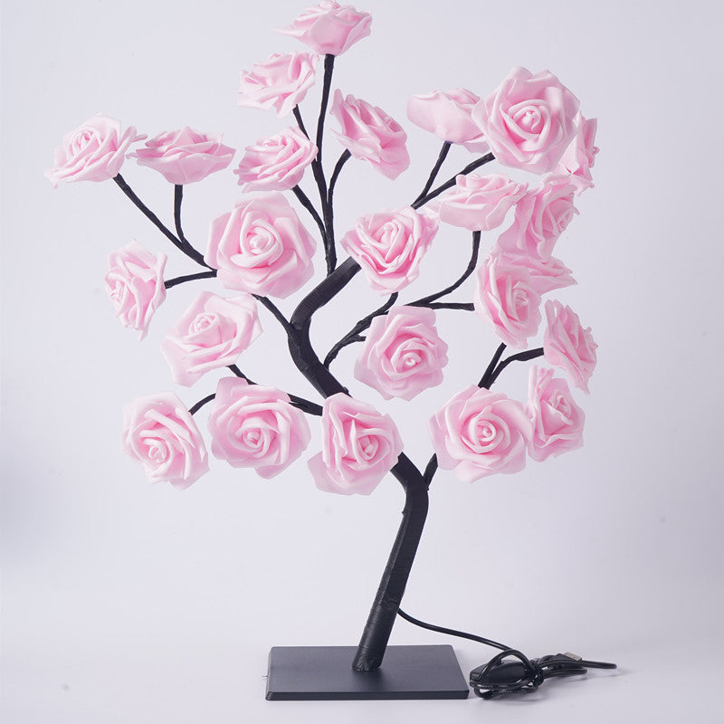 Rose flower tree light with pink roses on black branches, dark square base and cable