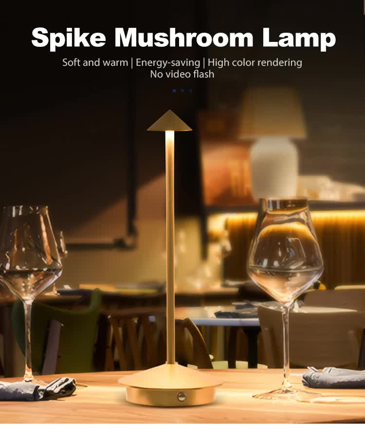 Gold mushroom table lamp with soft glowing cap and circular base