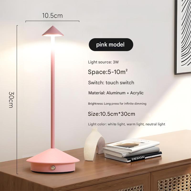Pink LED mushroom night light with round base and glowing top on a stand