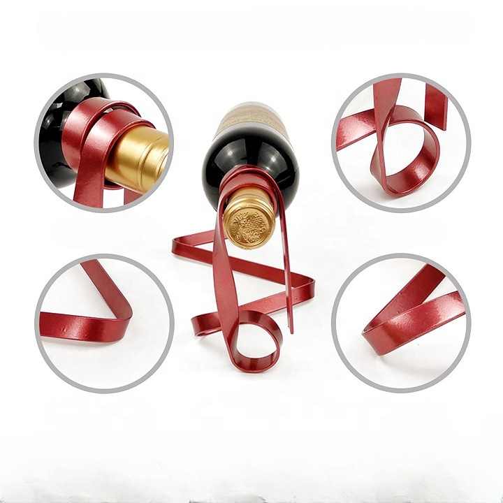 Red ribbon-style wine bottle holder with circular metal frame and two arms