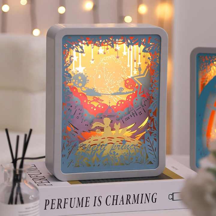 3D paper night light with gray frame and blue border, colorful starry landscape