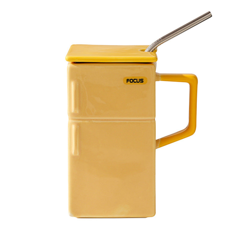 Yellow ceramic mug with lid and metal straw, rectangular fridge-style handle