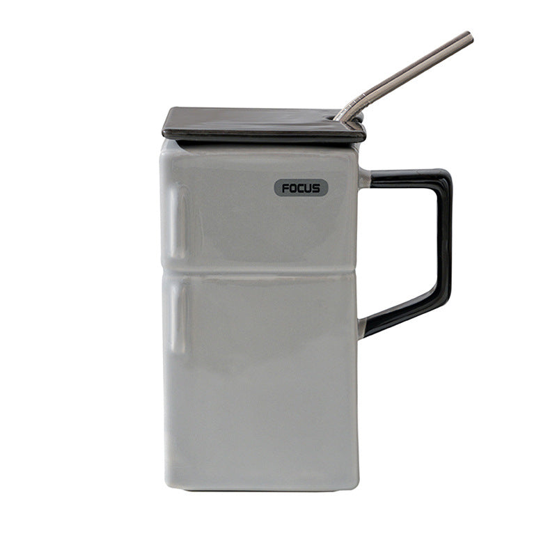Grey ceramic refrigerator-style mug with lid and straw, black side handle