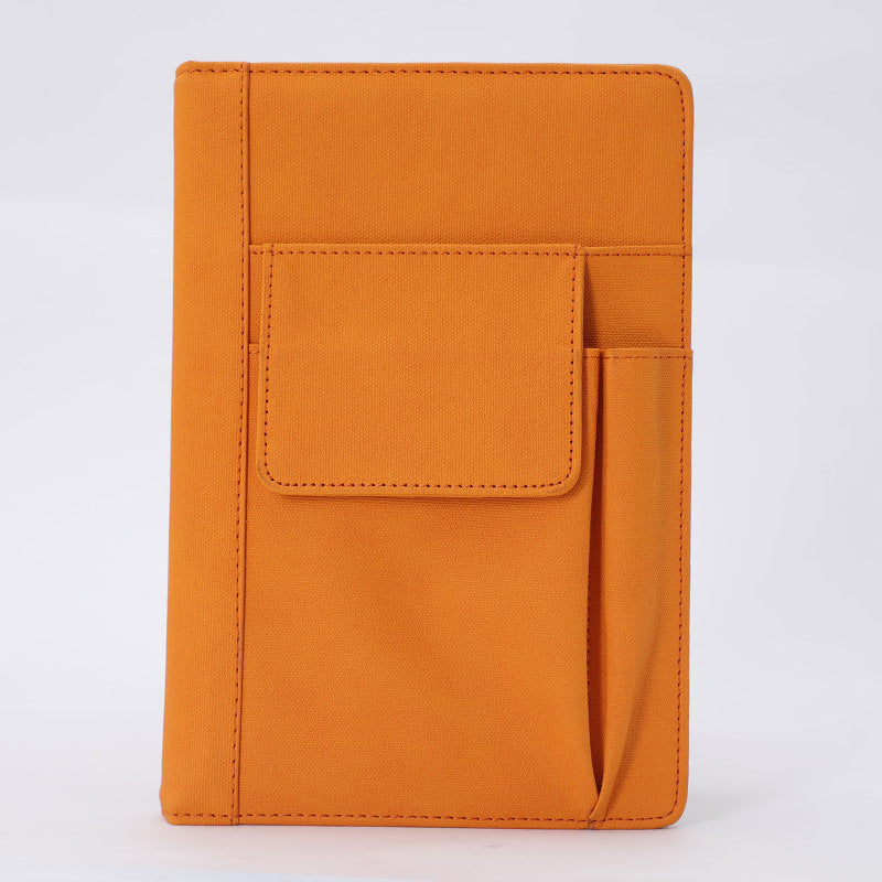 Orange A5 PU leather notebook with front pocket and stitched cover