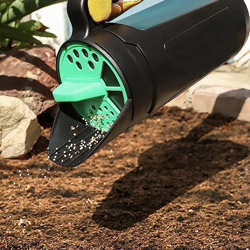 Portable handheld seeder dispensing with green perforated outlet on black body