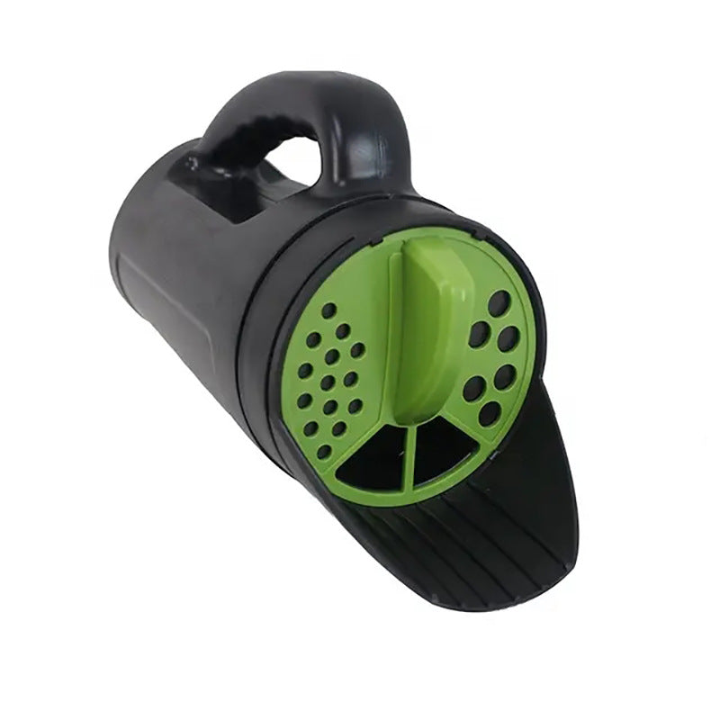 Handheld spreader end view, black casing with green rotating perforated wheel