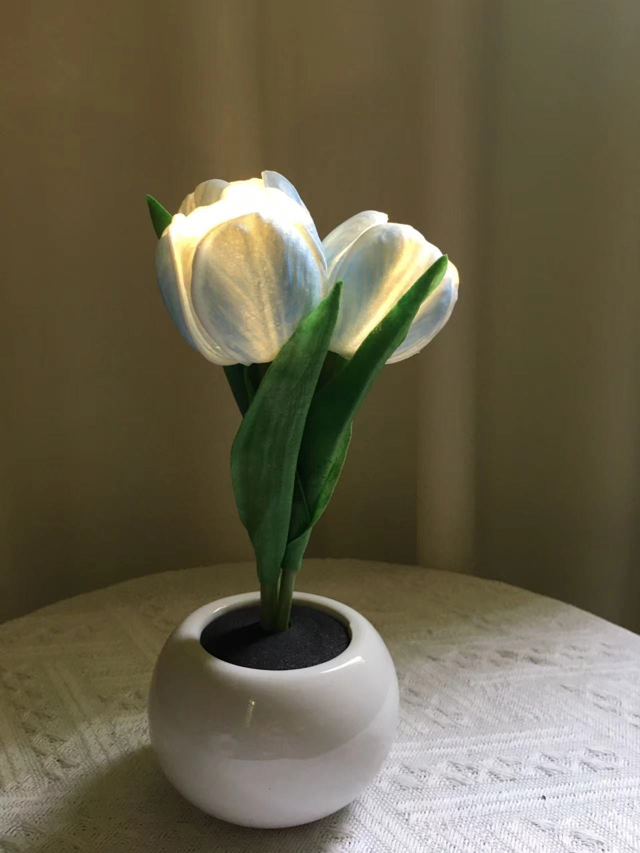 White tulip night light with glowing blooms and ceramic pot base