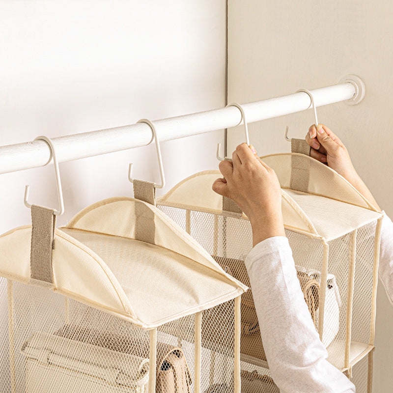 4-tier hanging storage bag with clear mesh panels and fabric pockets