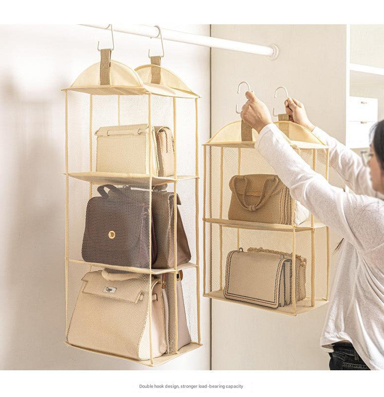 Beige hanging storage bag organizer with four tiers and multiple hanging hooks