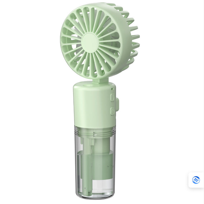 Portable mini spray fan with round green fan grille and clear mist tank base