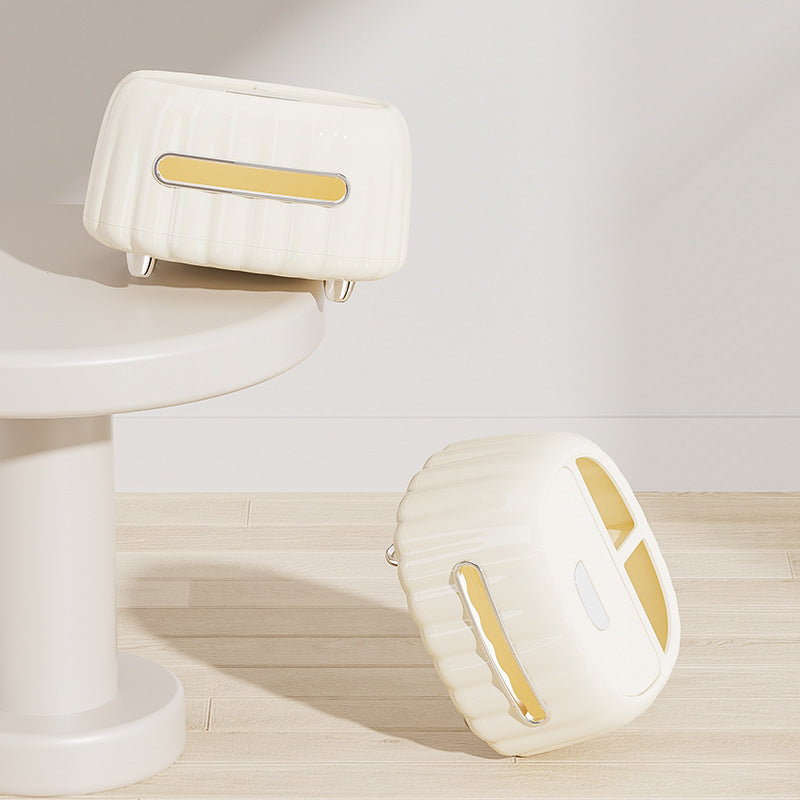 White tissue box organizer with gold accent grips and cutout storage openings