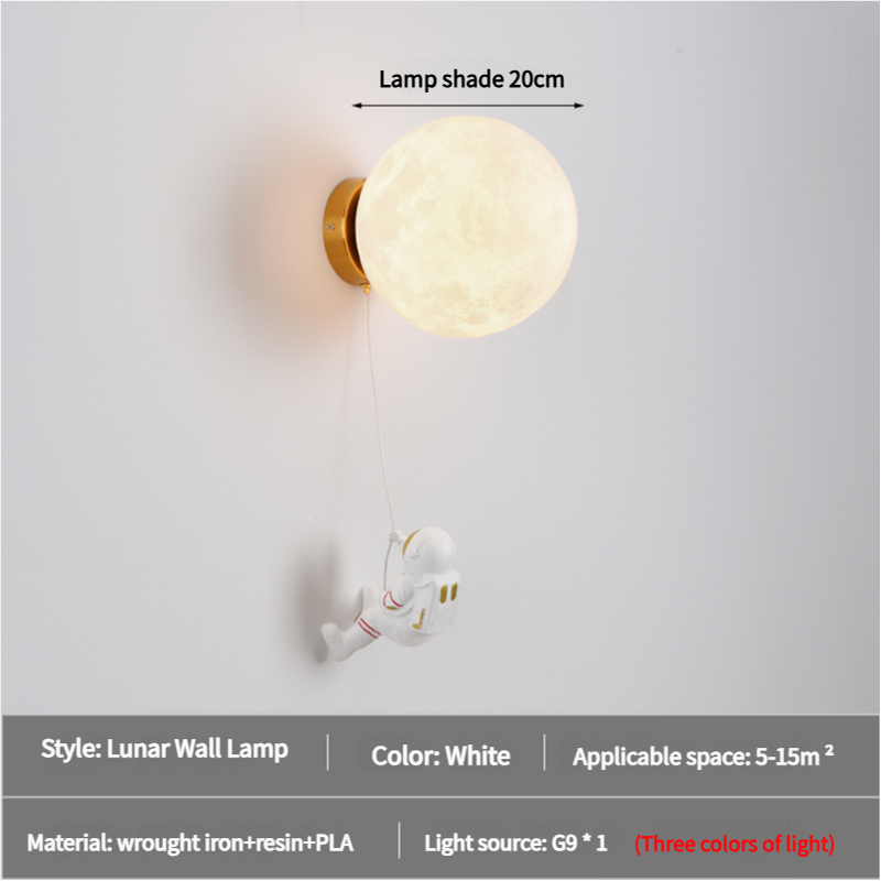 Astronaut moon wall lamp with round cream moon shade and brass wall bracket, dangling cord