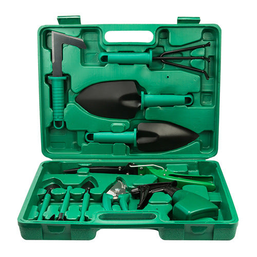 Green plastic gardening tool set case with multiple hand tools and blades