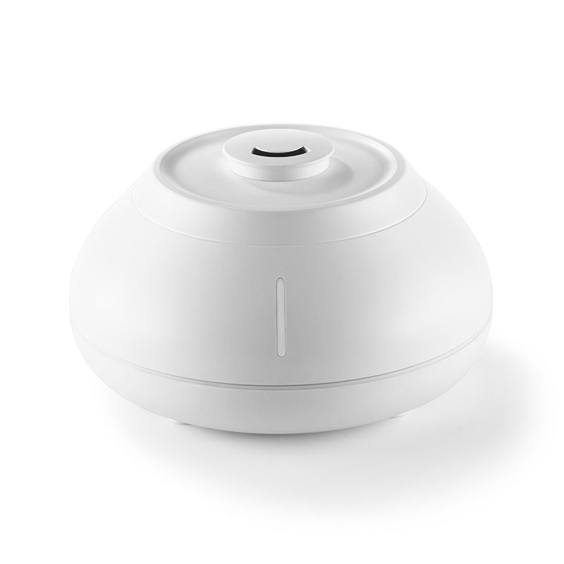 White aroma diffuser with circular top and mist outlet