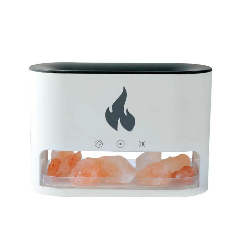 White Himalayan salt aroma diffuser with clear reservoir, orange crystal bed, flame LED icon