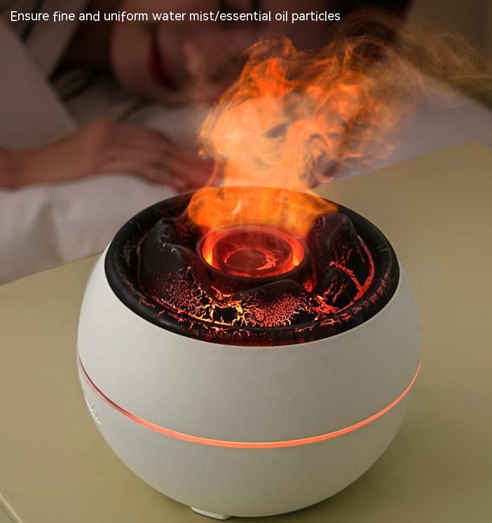White aroma diffuser releasing orange flame effect and mist from top basin