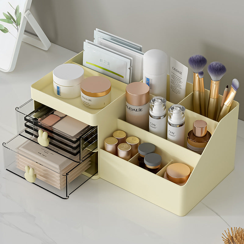 Cream drawer cosmetic organizer with open dividers and two metal pull-out drawer levels
