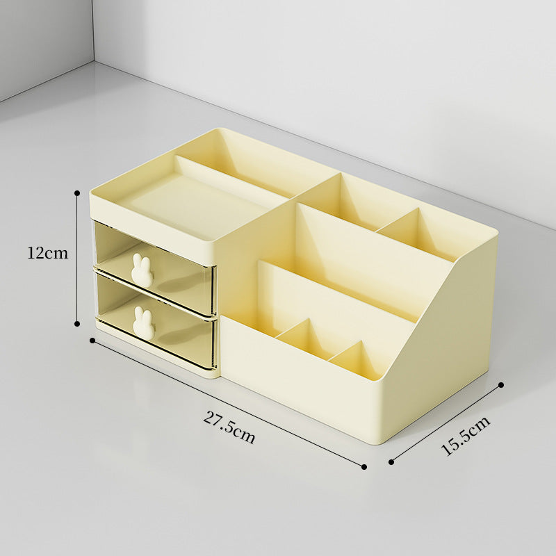 Yellow drawer-style cosmetic organizer with open compartments and two sliding storage drawers