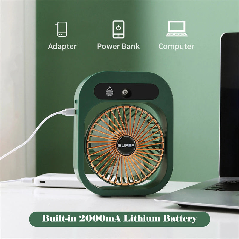 Portable misting fan, green body with circular grille and top controls for charging