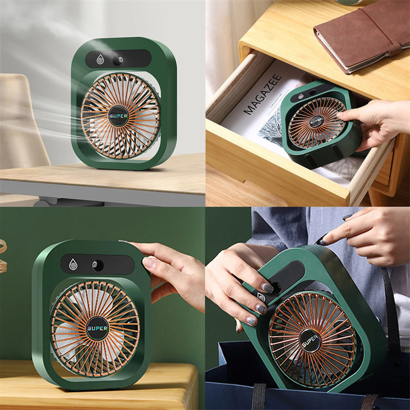 Portable misting fan in green, shown in use with hands adjusting position near table
