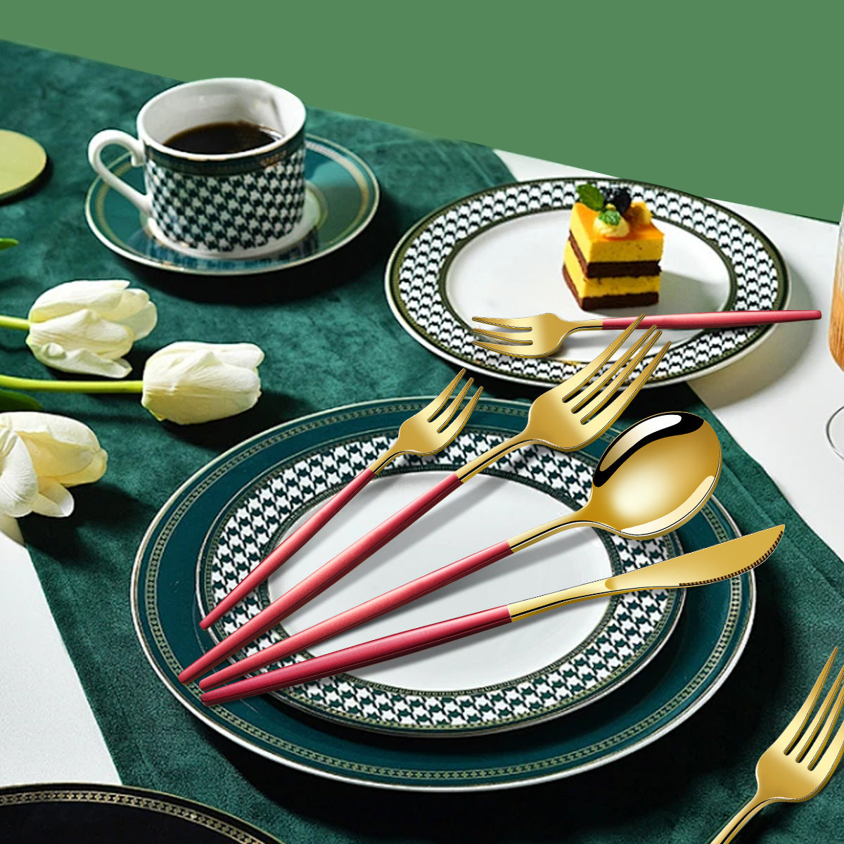 Gold-tone flatware with pink handles arranged on plates for dinner serving