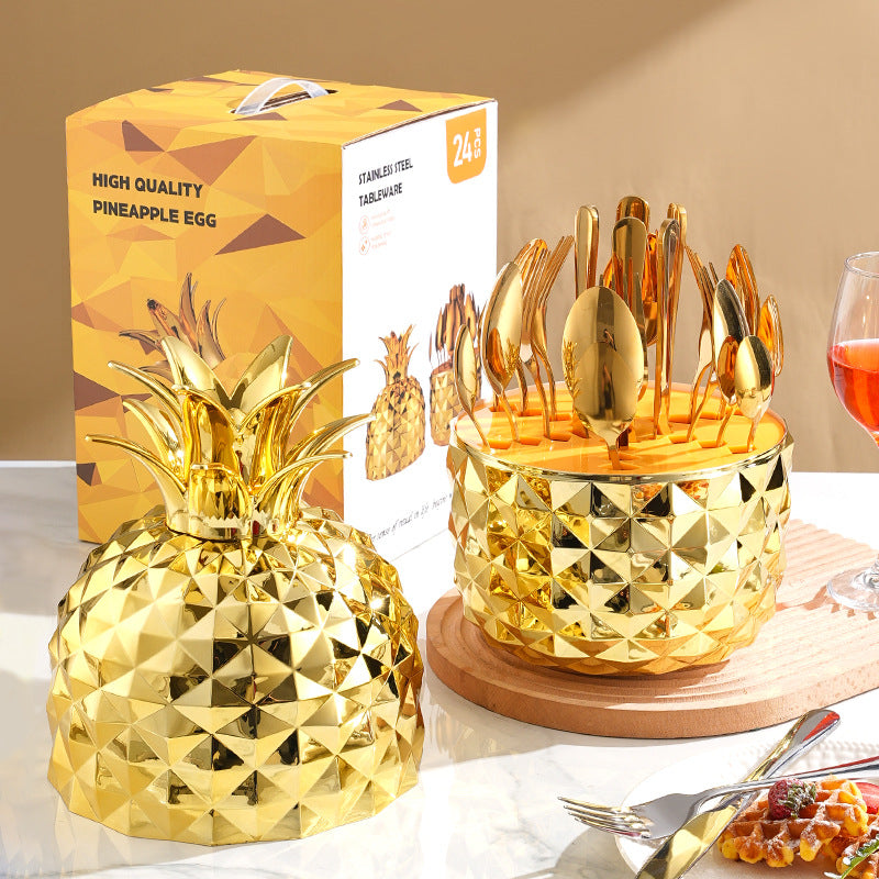 Gold pineapple-shaped 24-piece cutlery set with stainless utensils in display stand