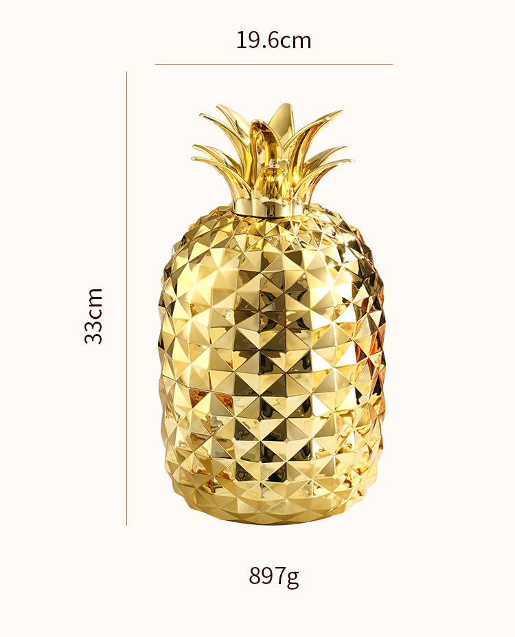 Gold pineapple-shaped cutlery holder, 19.6cm and 33cm size chart, 897g
