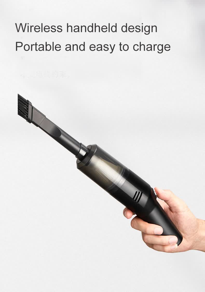 White handheld cordless vacuum with crevice tool held in hand
