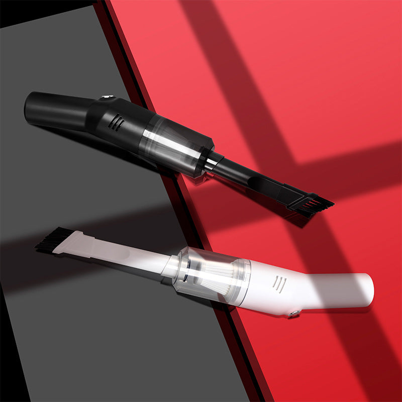 Black handheld vacuum cleaner with clear dust tank and crevice nozzle