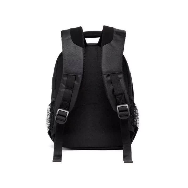 Black water-resistant DSLR camera backpack with padded shoulder straps and back panel