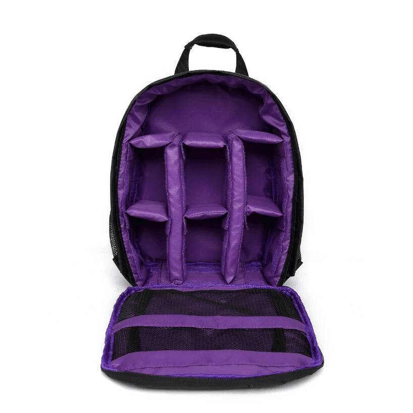 Purple-lined camera backpack, open padded compartments with zip closure.