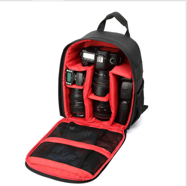 Red-lined water-resistant camera backpack with open padded interior compartments