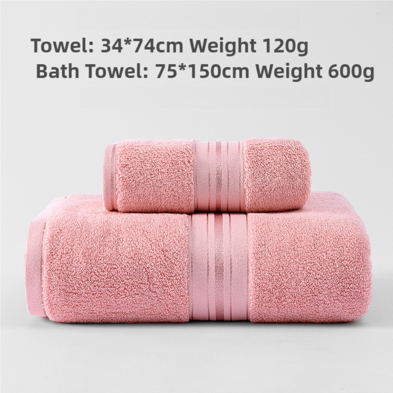 Pink cotton towel set with two stacked folded towels, terry loop texture